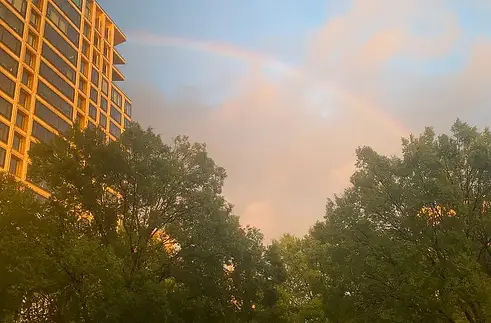 Rainbow arching past 551 West 21st Street