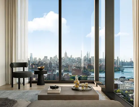 Living room with city and river views