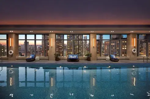 Indoor pool with skyline views