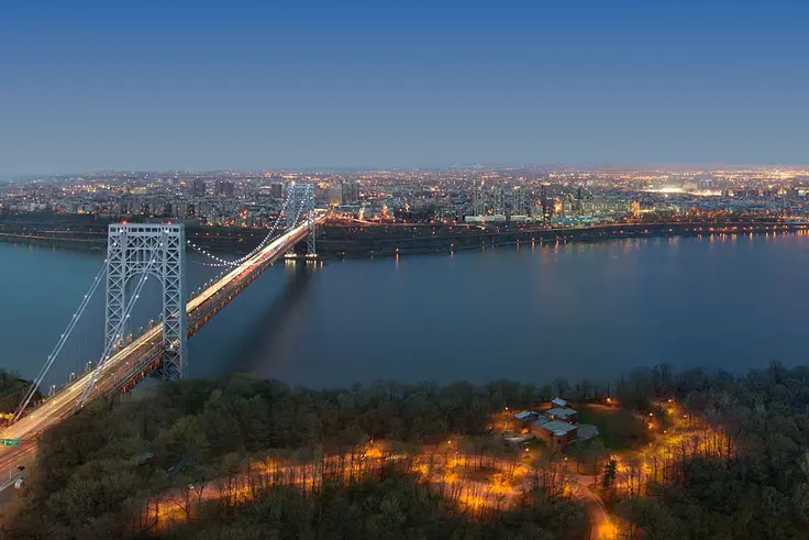 The second tower of the 900-unit rental development in Fort Lee has topped out, and will soon offer views like these. (Image via rentthemodern.com)