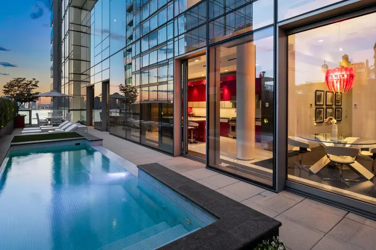 Another super-luxe building amenity? No - a private pool with a penthouse! (166 Perry Street via Nest Seekers)