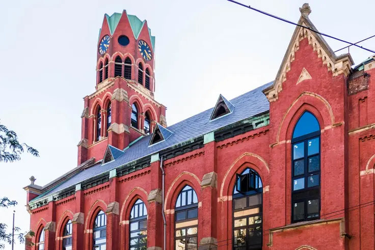 A new rental development has debuted in Bushwick, with some units located inside a former church built in the 1890s. (Image via Nooklyn.com)