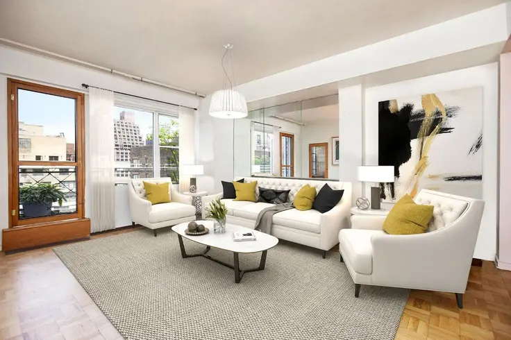 A one-bedroom penthouse at The Charles House is asking below $900K; via The Corcoran Group