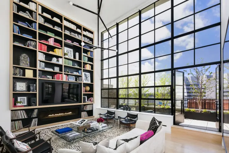 Living room of 456 West 19th Street's Penthouse H; COmpass