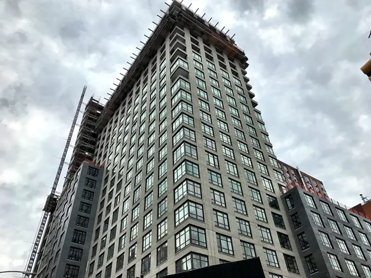 The new mixed-use residential tower at 210 Livingston Street in Downtown Brooklyn is nearing completion. (Credit: CityRealty)