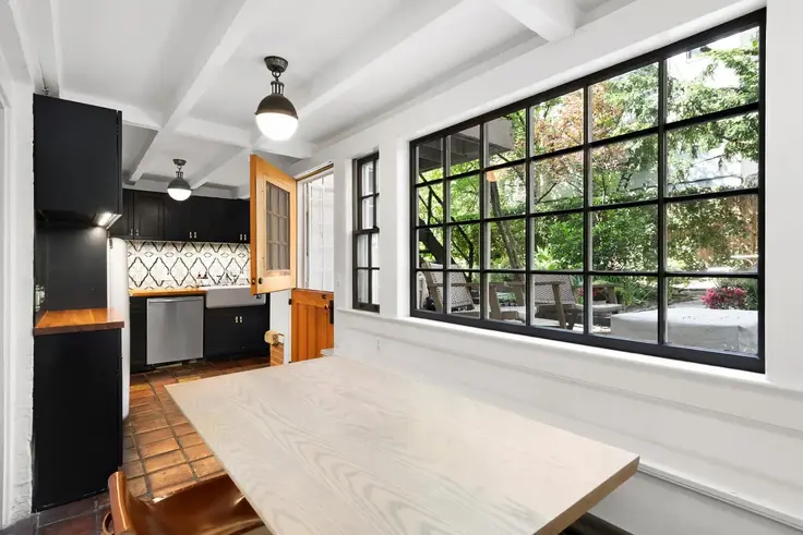 This kitchen is located in a maisonette unit, not a private home (109-119 East 10th Street, #GARDEN - Douglas Elliman)