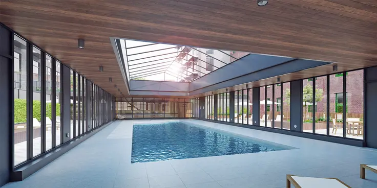The new building will have a sky-lit pool for residents. 