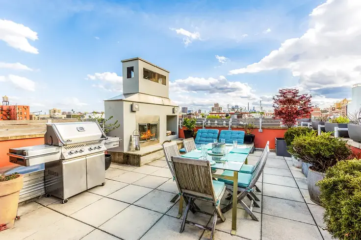 Not to be confused with common outdoor space - this terrace with gas grill is exclusive to the penthouse. (265 West 122nd Street, #PH - Core Group Marketing)