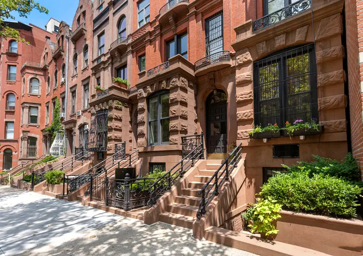 Though Manhattan gets much attention for its skyscrapers, it's teeming with sedate blocks lined with charming brownstones and townhouses  (Halstead)