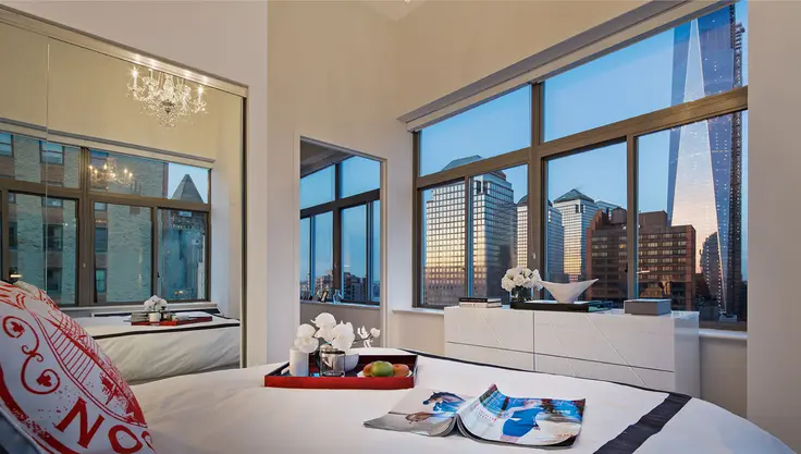 Model residence at 90W with views of 1 WTC, via Moinian Group
