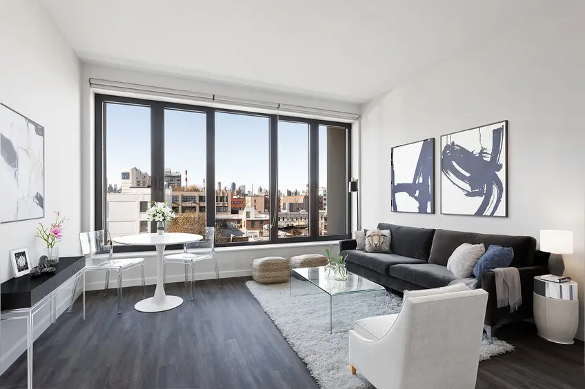 Airy apartments and large windows define the apartment of LINE LIC (All images via Modern Spaces)