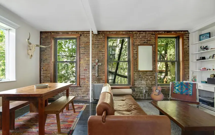 Exposed brick is one of the most beautiful and coveted prewar details in New York. (249 East 7th Street via Corcoran)