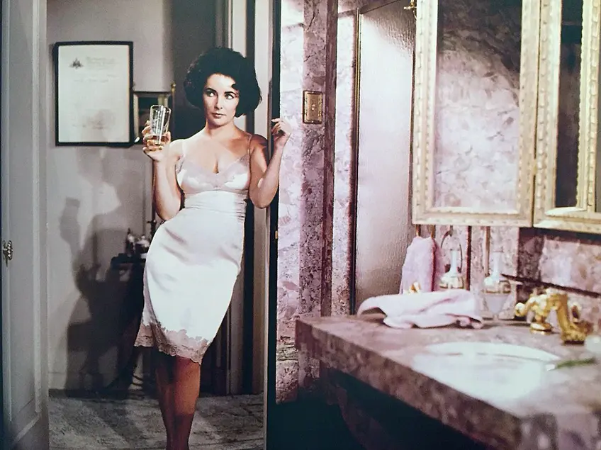 Elizabeth Taylor silk slip in Butterfield8 (1960, via Scoopnest)