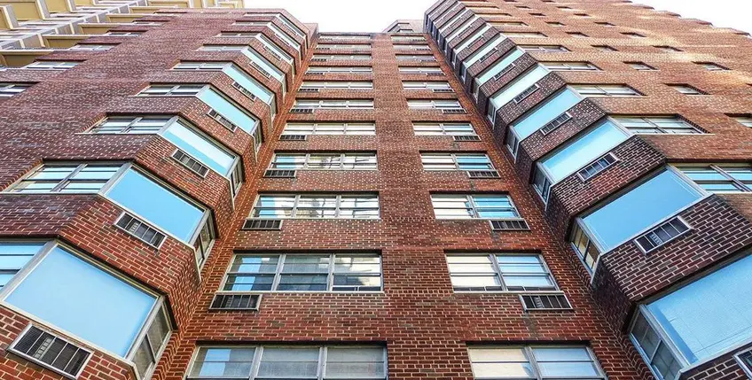 40 East 89th Street, a post-war brick building with 17 floors, managed by Rose Associates.